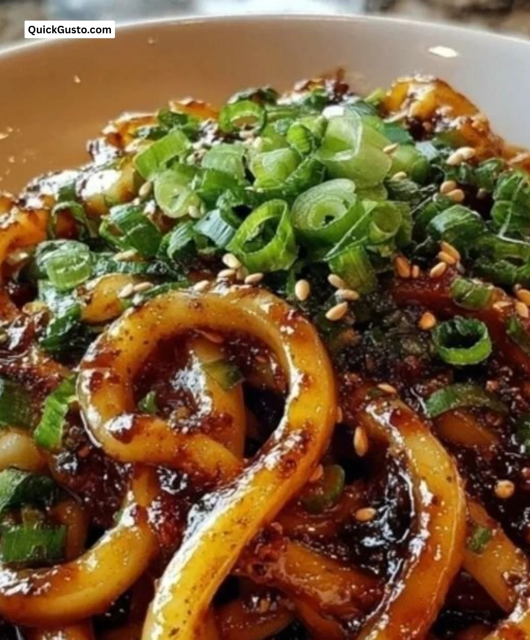 Plate of udon noodles served with various tasty sauces