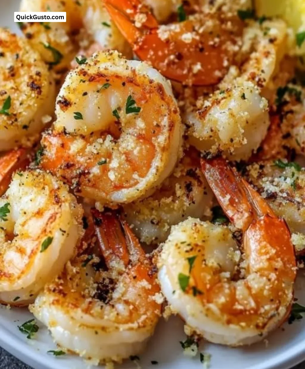 Delicious air fryer garlic parmesan shrimp served on a plate.