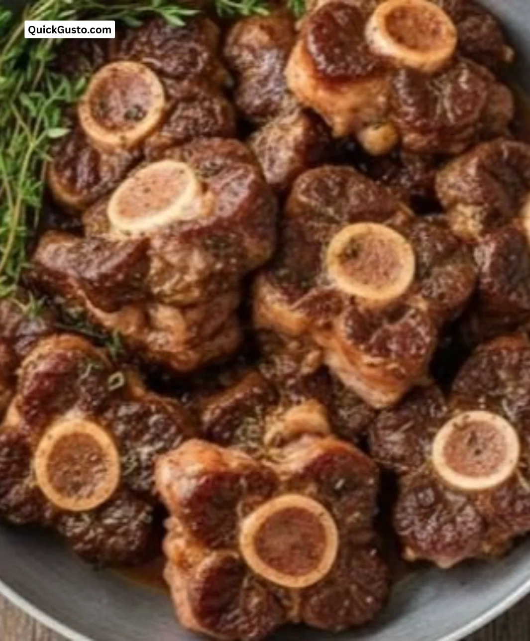 Delicious plate of authentic Jamaican Oxtail stew with rice and peas