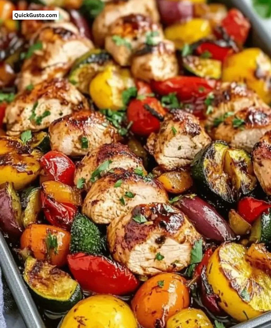 Balsamic glazed chicken with colorful veggies in a delicious dish