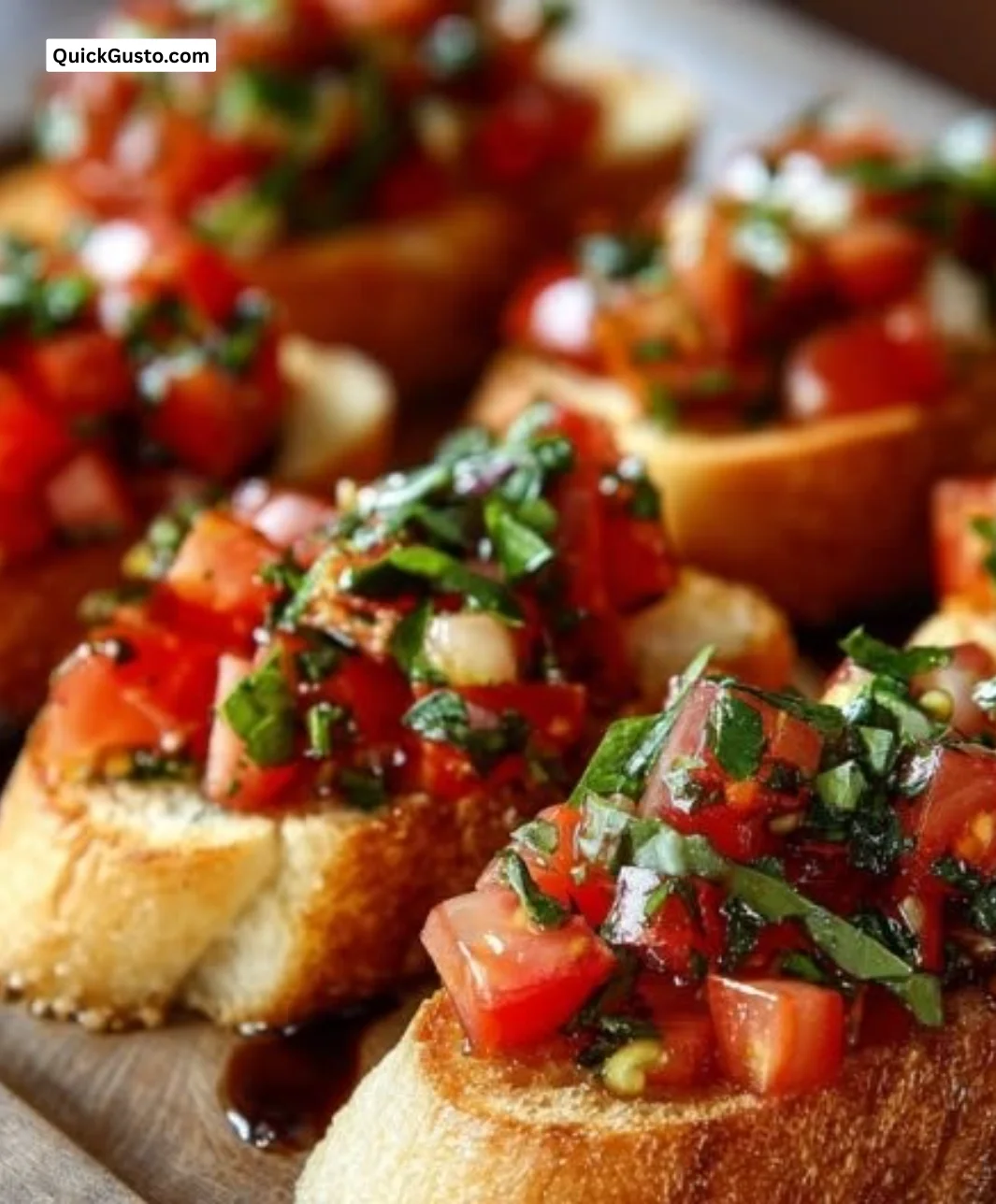 Delicious Bruschetta topped with fresh tomatoes and basil on toasted bread.