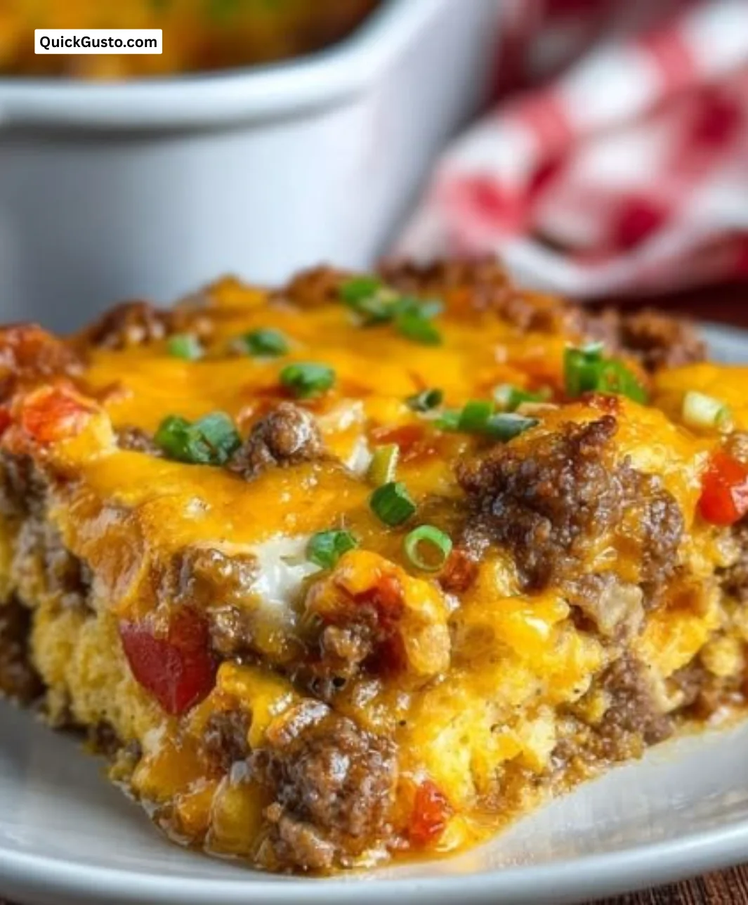 Delicious Cattle Drive Casserole served in a rustic dish on a wooden table.