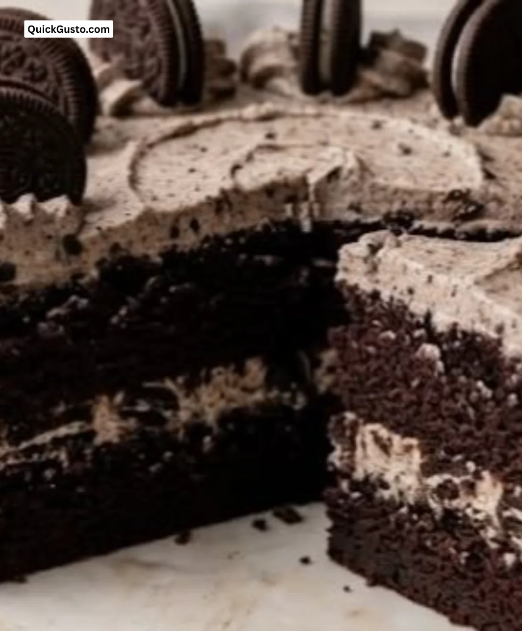 Delicious Chocolate Oreo Cake topped with cookies and chocolate frosting