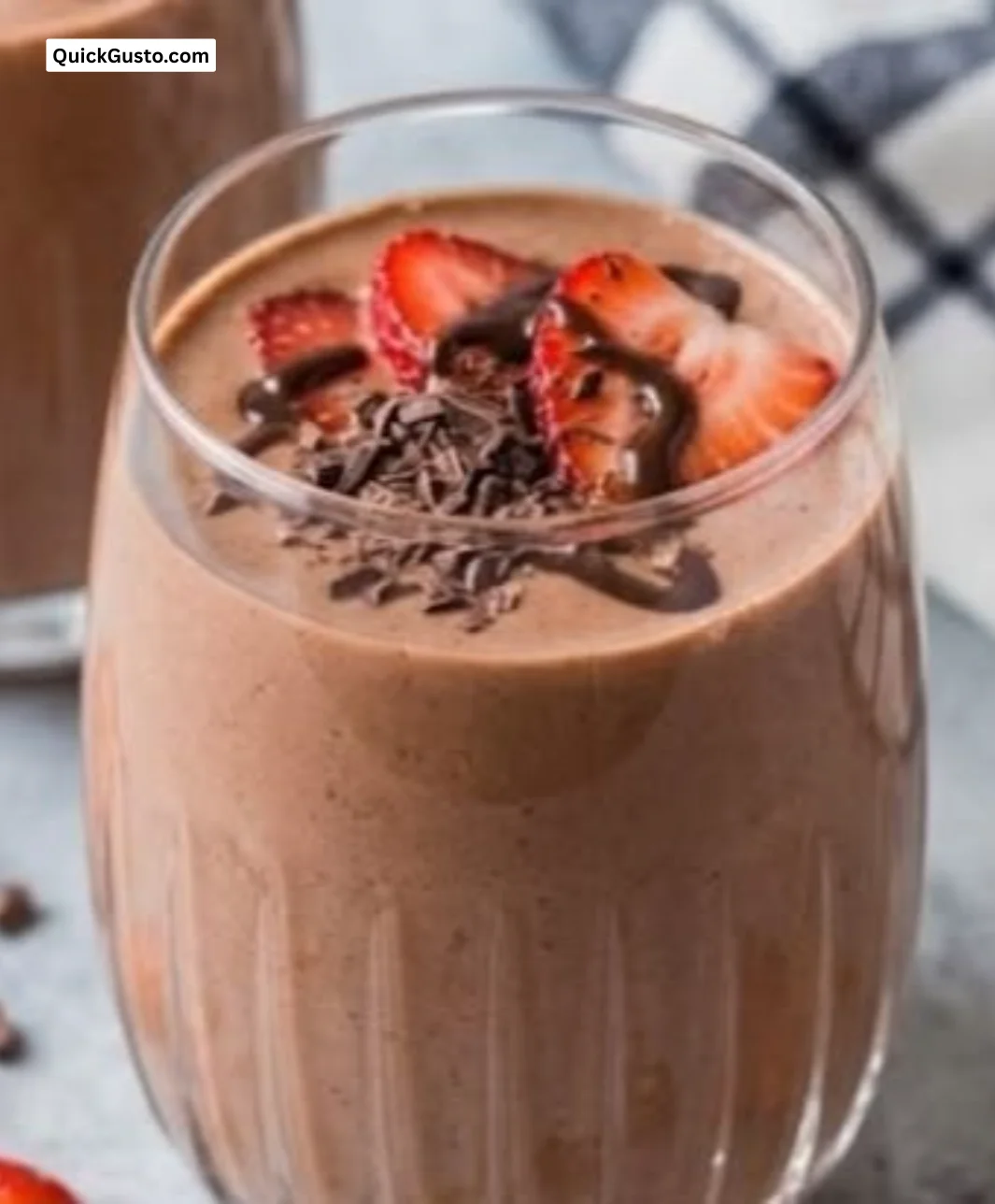 Delicious Chocolate Strawberry Smoothie in a glass with fresh strawberries