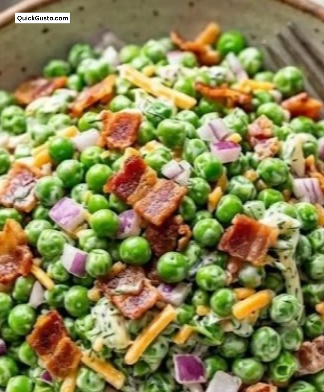 Bowl of Classic Pea Salad with vibrant green peas and fresh ingredients