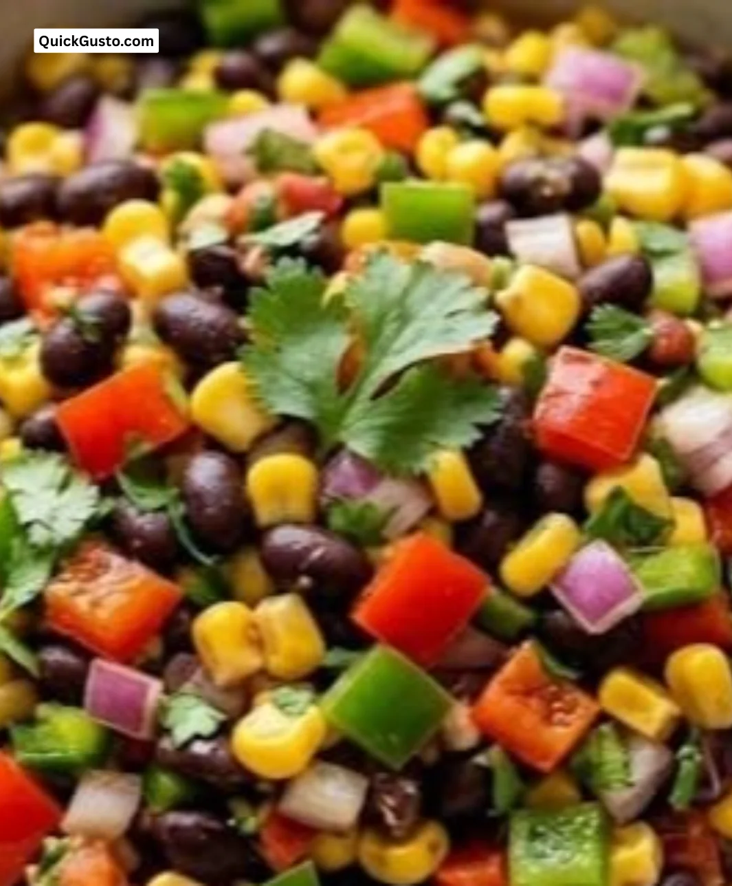 Bowl of colorful Cowboy Caviar mixed with beans, corn, and veggies