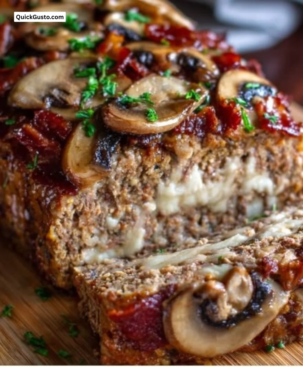 Cozy bacon mushroom Swiss cheese meatloaf served with vegetables