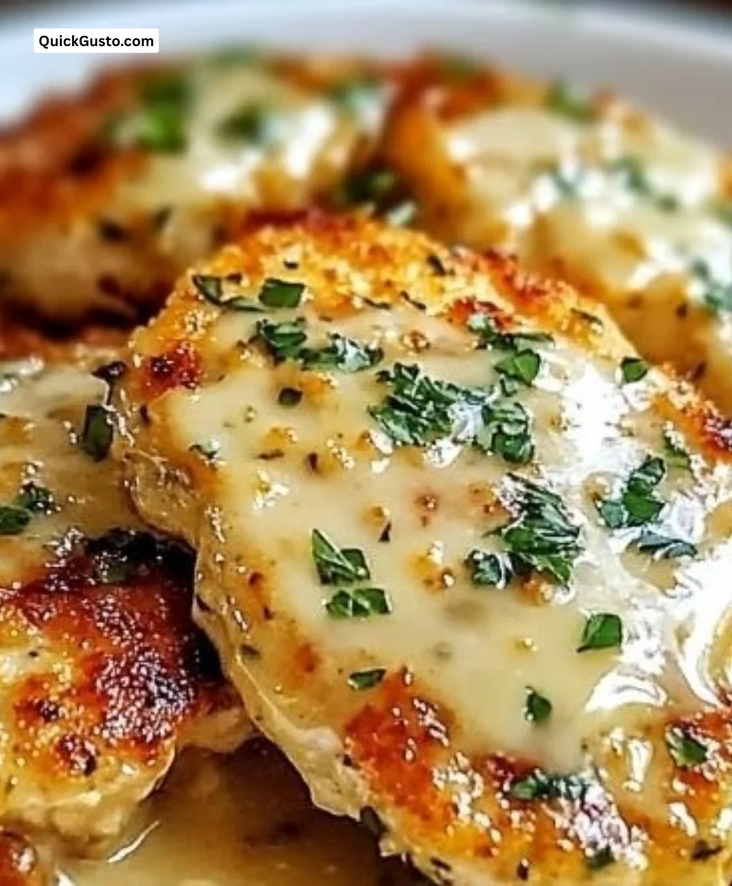 Plate of Crave-Worthy Chicken Romano with herbs and cheese