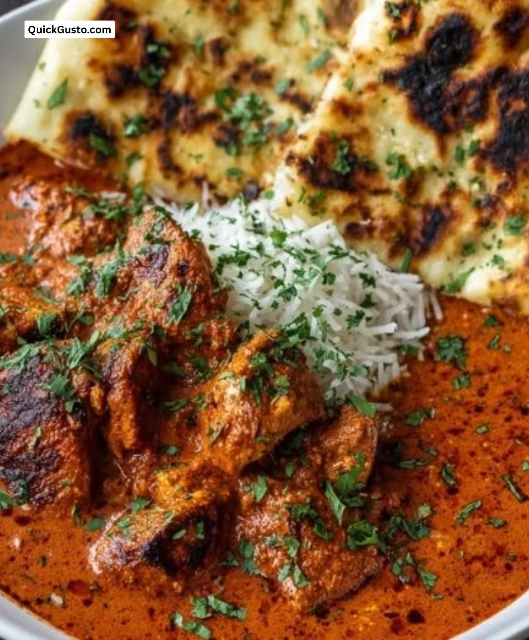 Delicious chicken tikka masala garnished with fresh cilantro