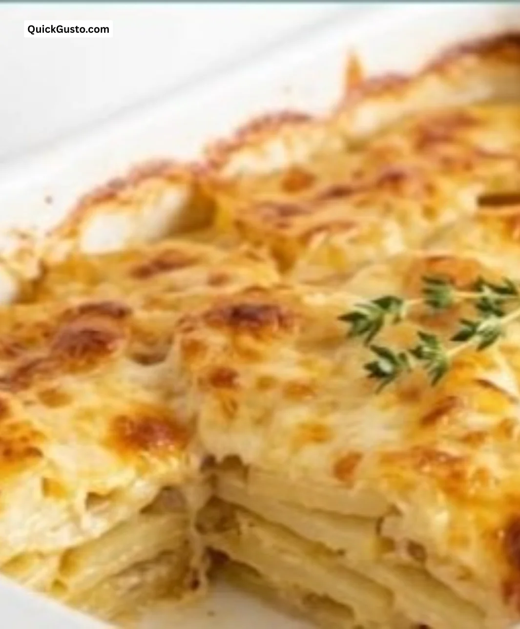Delicious creamy scalloped potatoes baked to perfection in a casserole dish.
