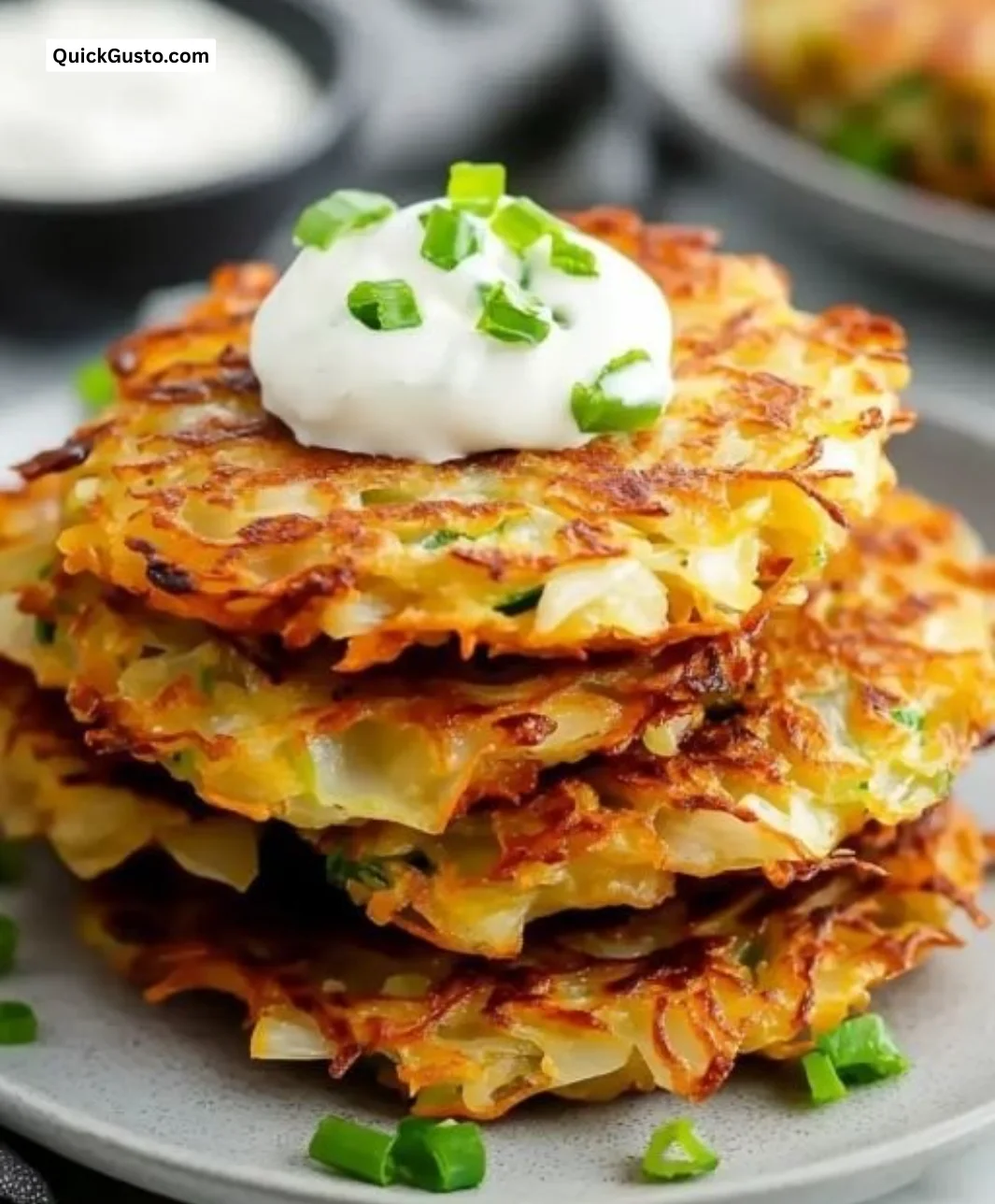 Crispy cabbage fritters with onions, served on a plate.