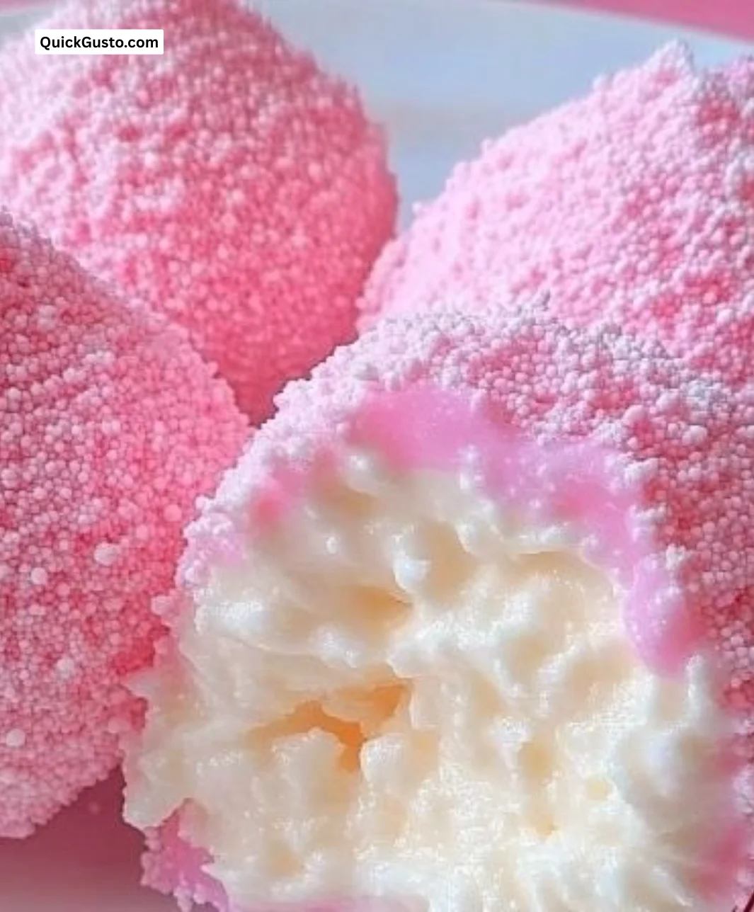 Crispy Cotton Candy Cheesecake Bombs served on a plate