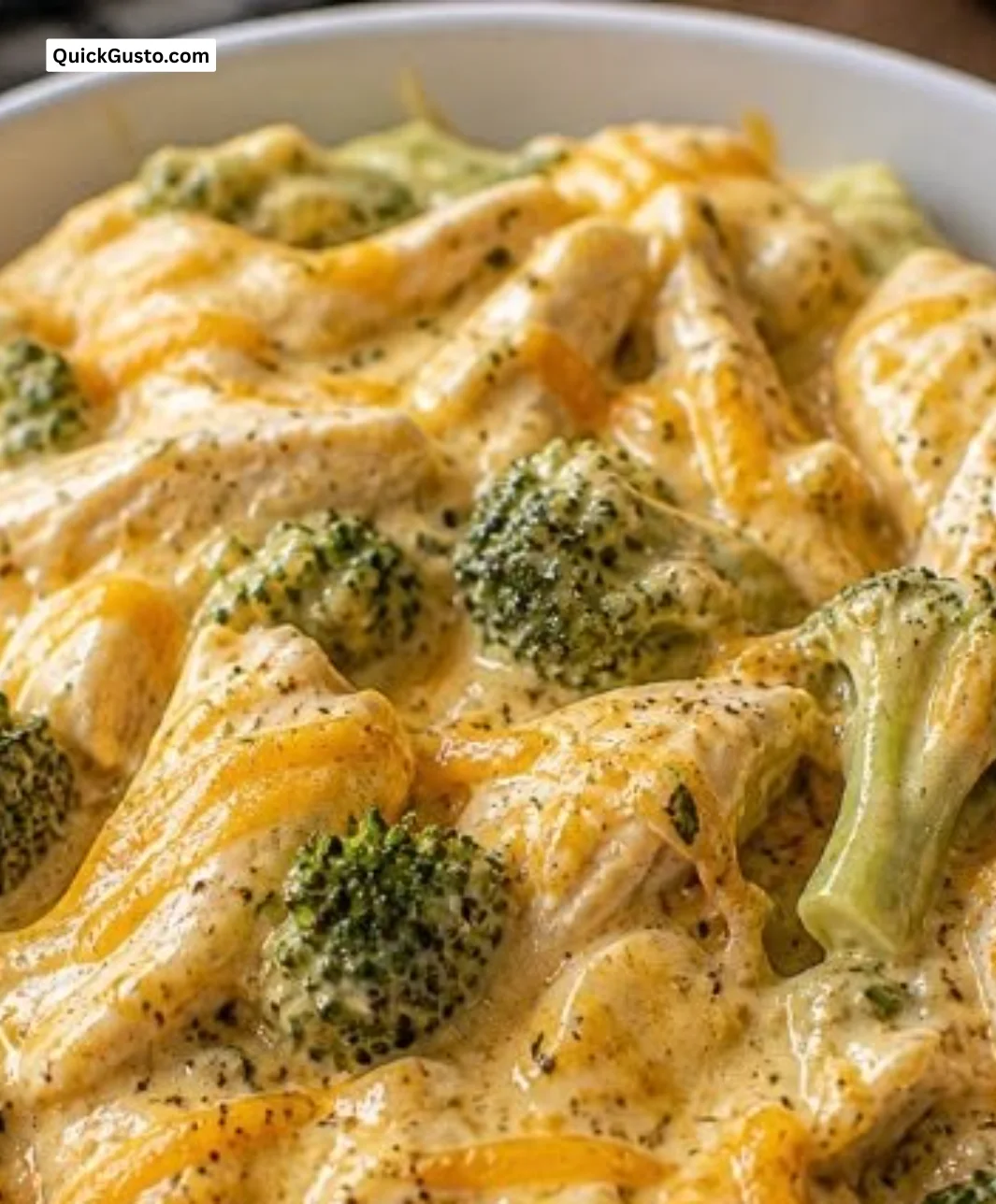 Creamy broccoli cheddar chicken dish in a crockpot, perfect for comfort food lovers.