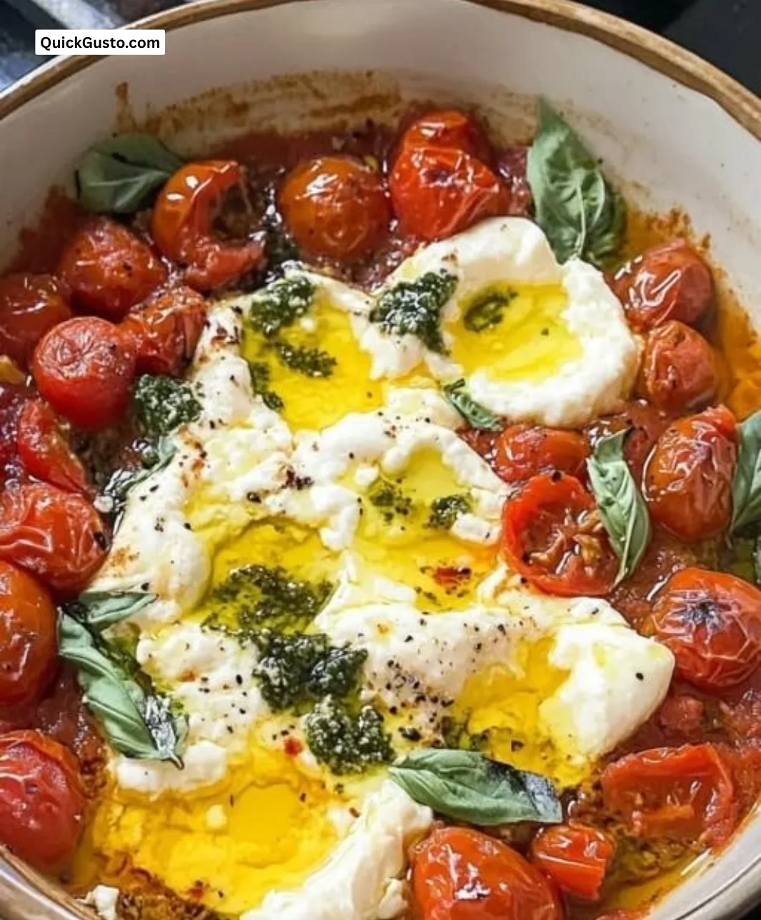 Delicious roasted tomato burrata dip served in a bowl, perfect for gatherings.