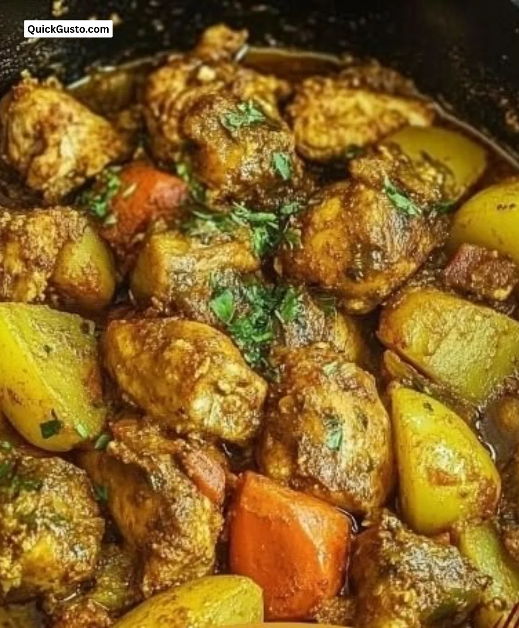 Delicious plate of Easy Jamaican Curry Chicken with vibrant spices and herbs.