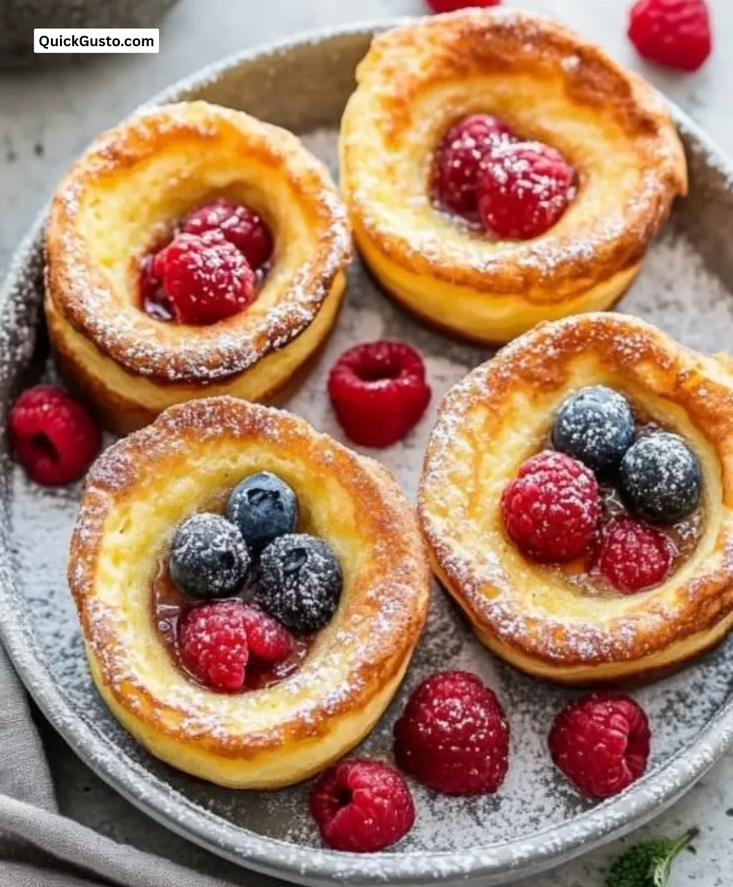 Delicious Mini Dutch Baby Pancakes baked in a muffin tin for breakfast