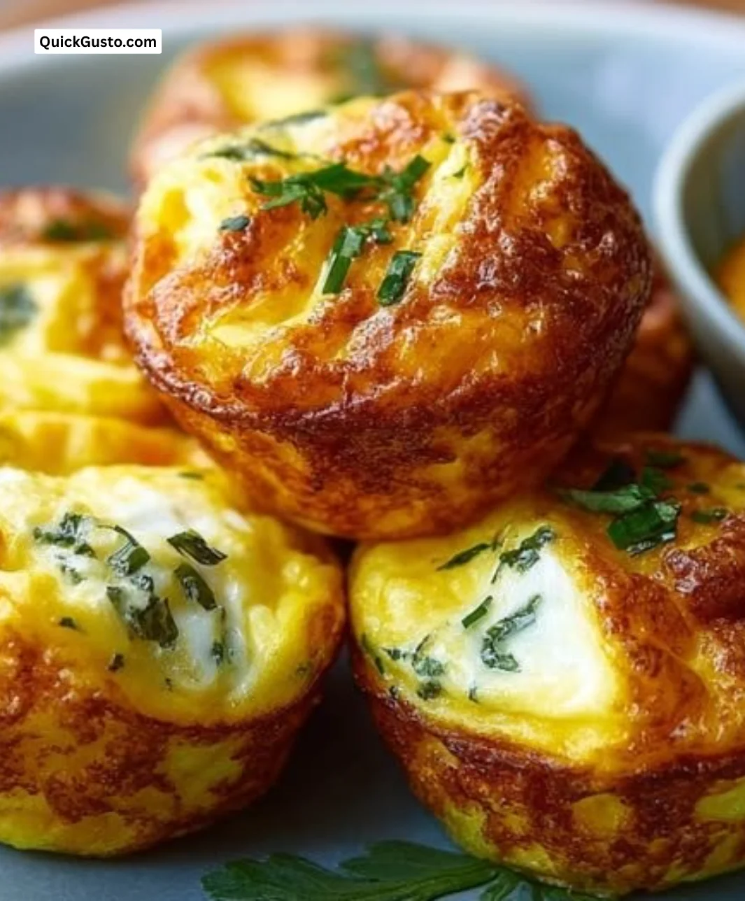 Delicious homemade egg bites served in a bowl with colorful ingredients.