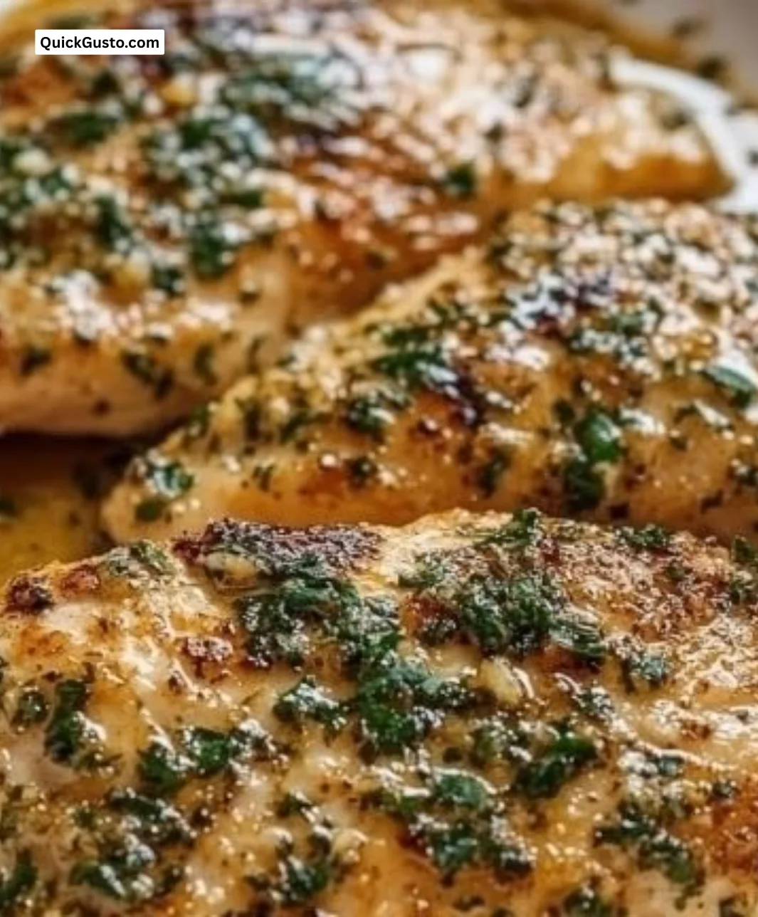 Delicious Garlic Butter Baked Chicken Breast served on a plate.