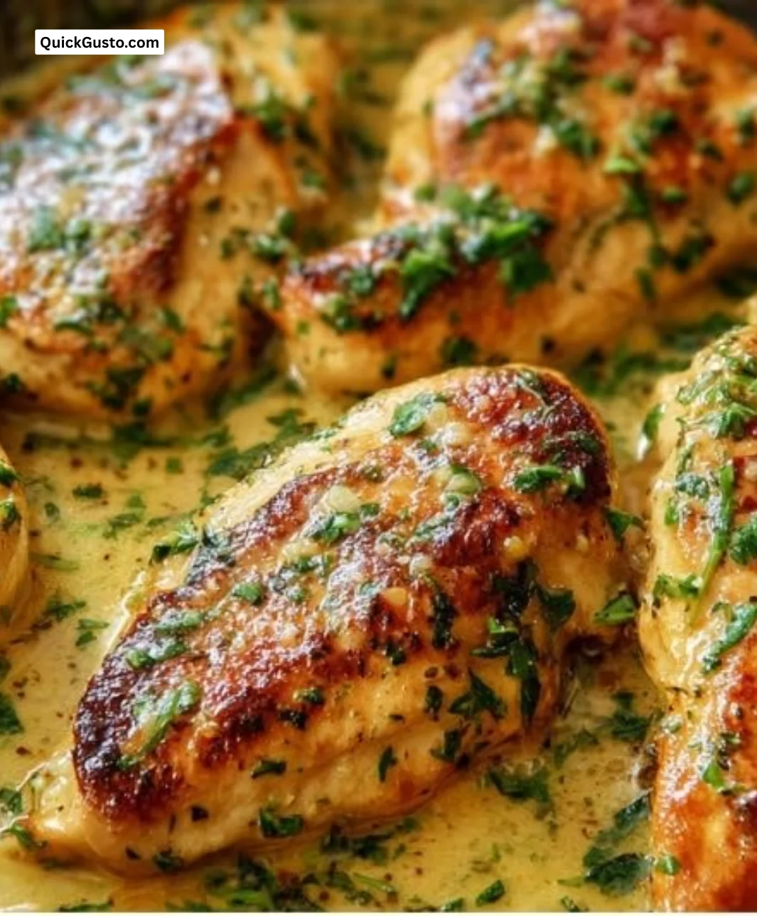 Delicious Garlic Butter Chicken served in a skillet with fresh herbs.