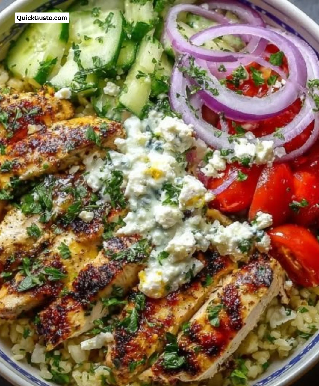 Greek Chicken Bowls with lemon-herb rice, vegetables, and feta cheese