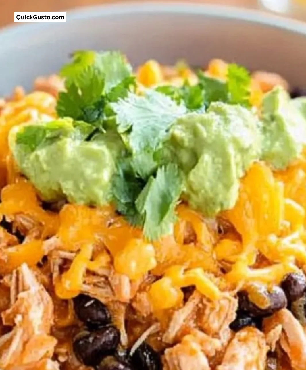 Healthy slow cooker chicken burrito bowl with fresh toppings