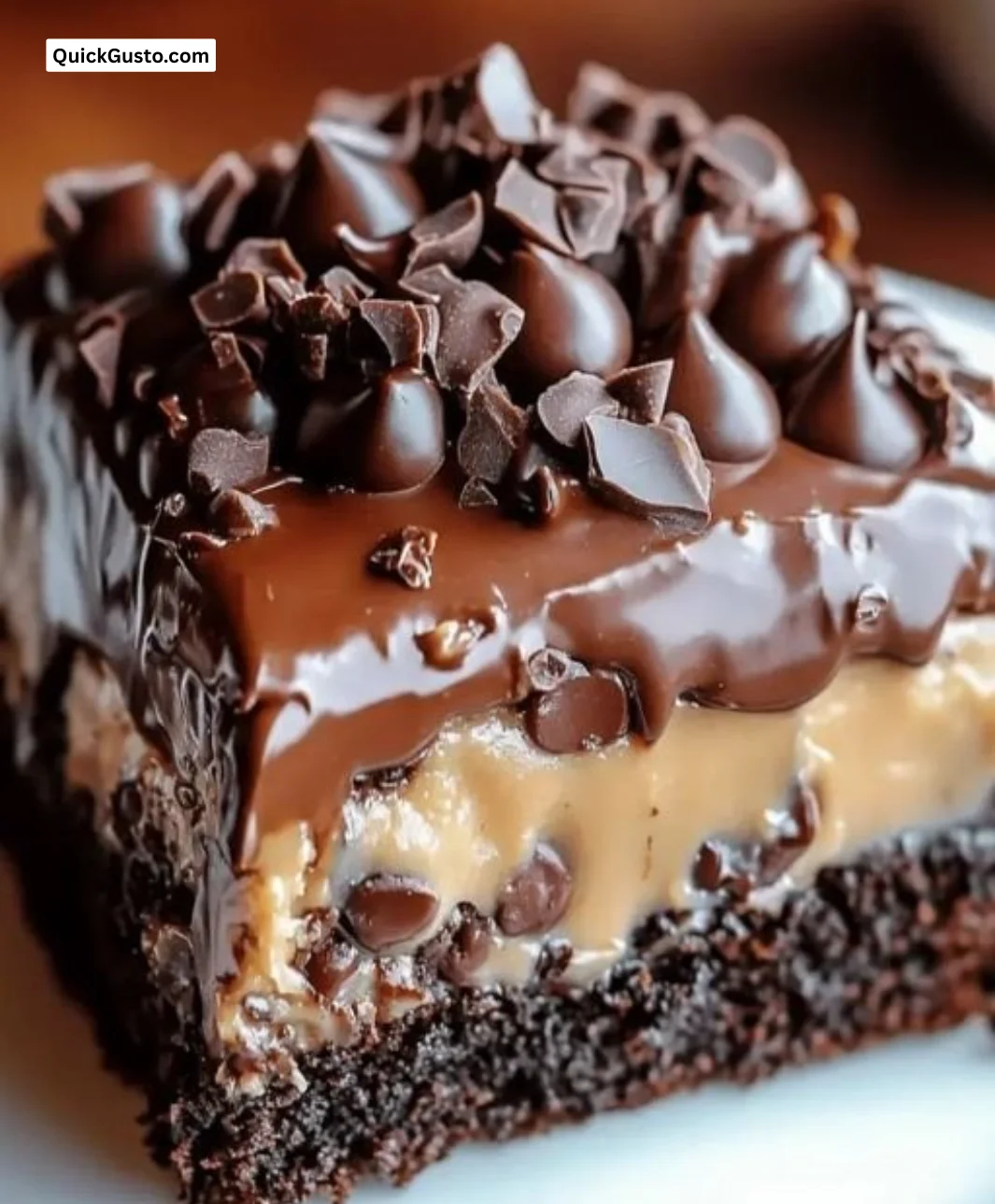 Deliciously rich Chocolate Turtle Cake topped with caramel and pecans