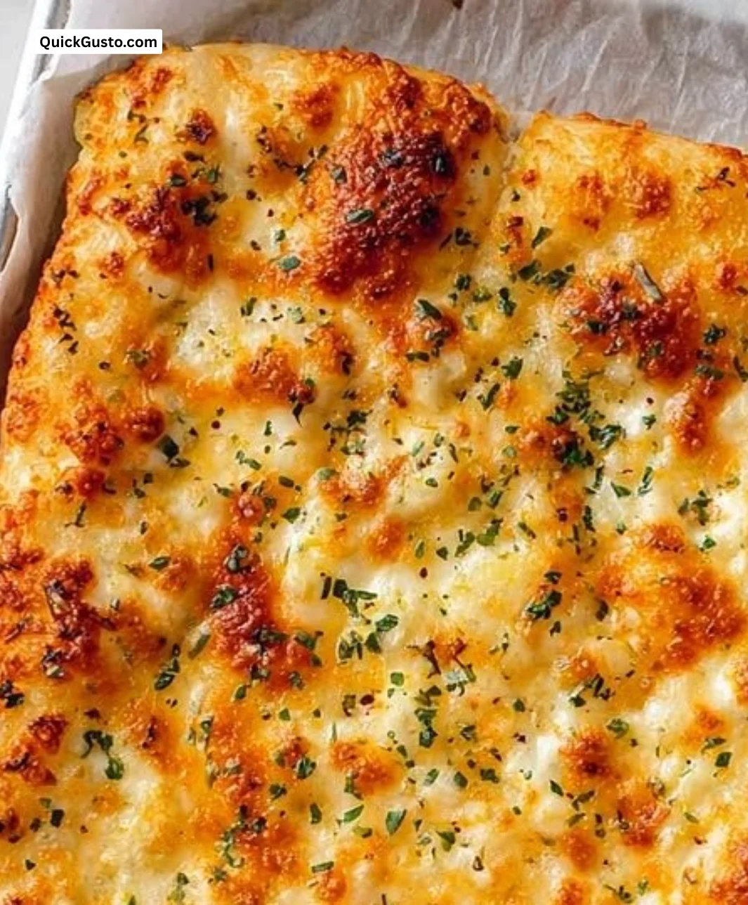 Delicious Greek yogurt garlic bread served warm with herbs and spices.