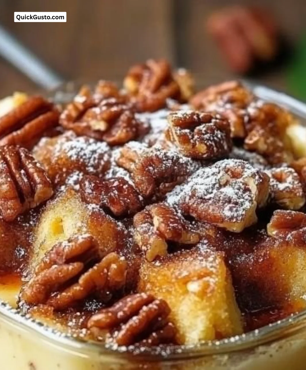 Delicious pecan bourbon bread pudding garnished with sauce