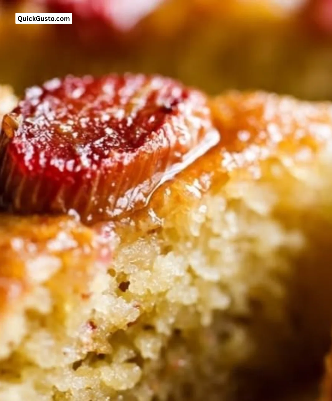 Lemon-Almond Cake with Roasted Rhubarb on a rustic wooden table