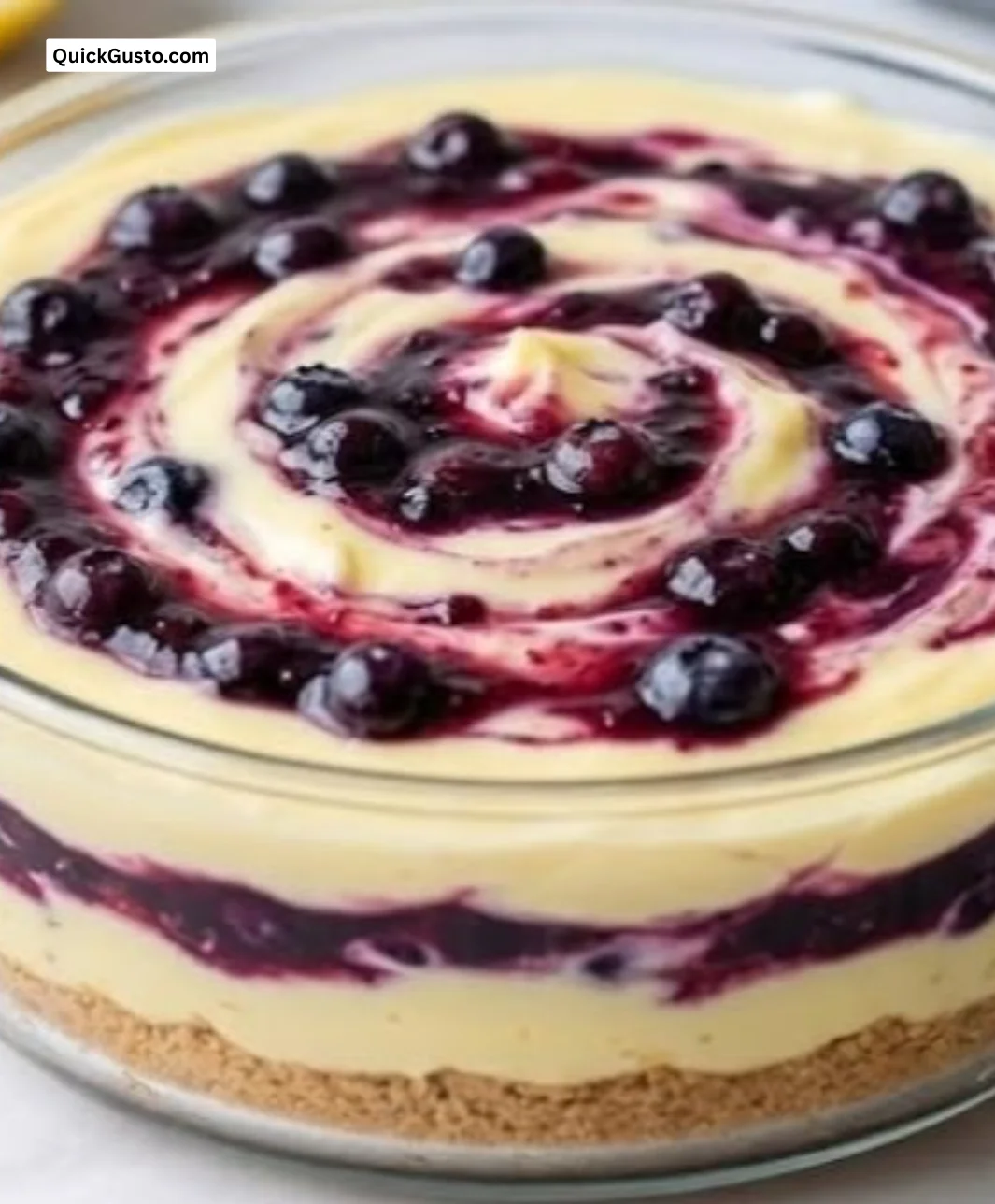 Lemon Blueberry Cream Cake with fresh blueberries and lemon zest topping