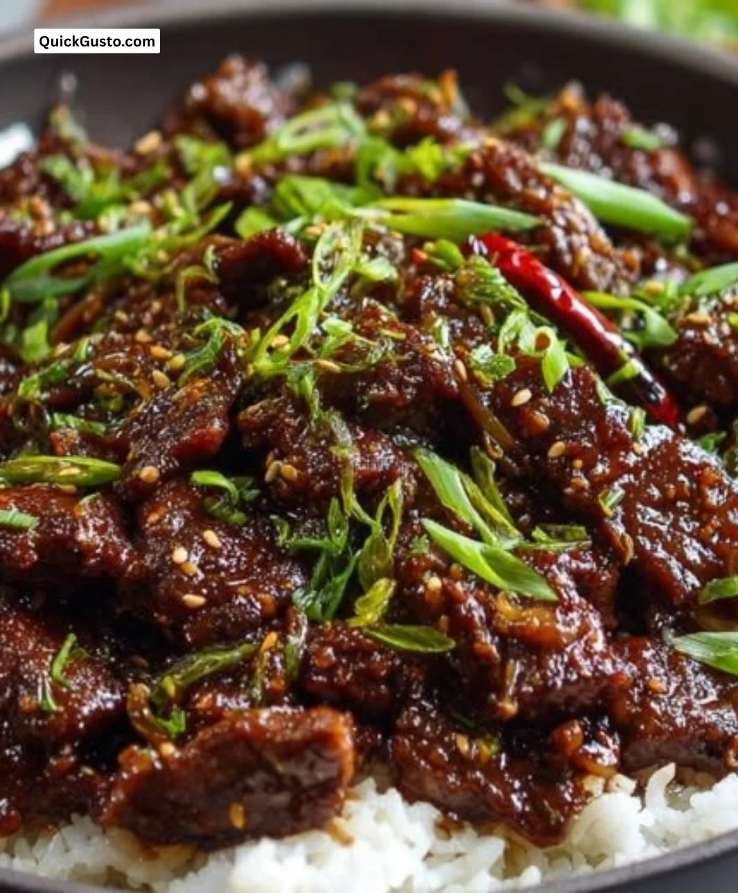 Delicious plate of Mongolian Beef served with vegetables and rice