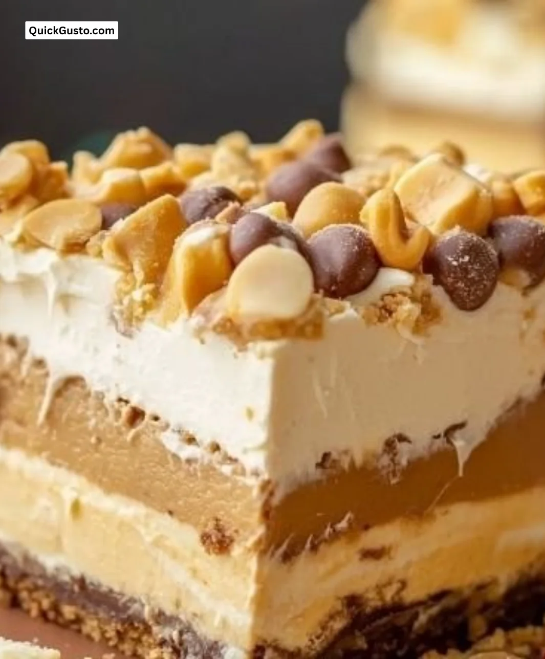 No-bake peanut butter lasagna dessert with creamy layers and chocolate topping.