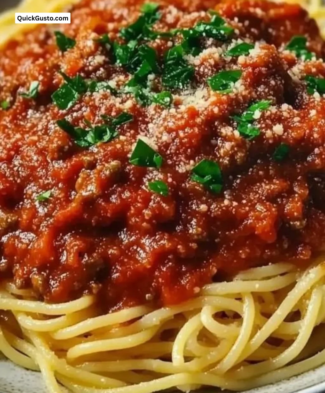 Homemade Old World Italian spaghetti sauce in a rustic kitchen setting.