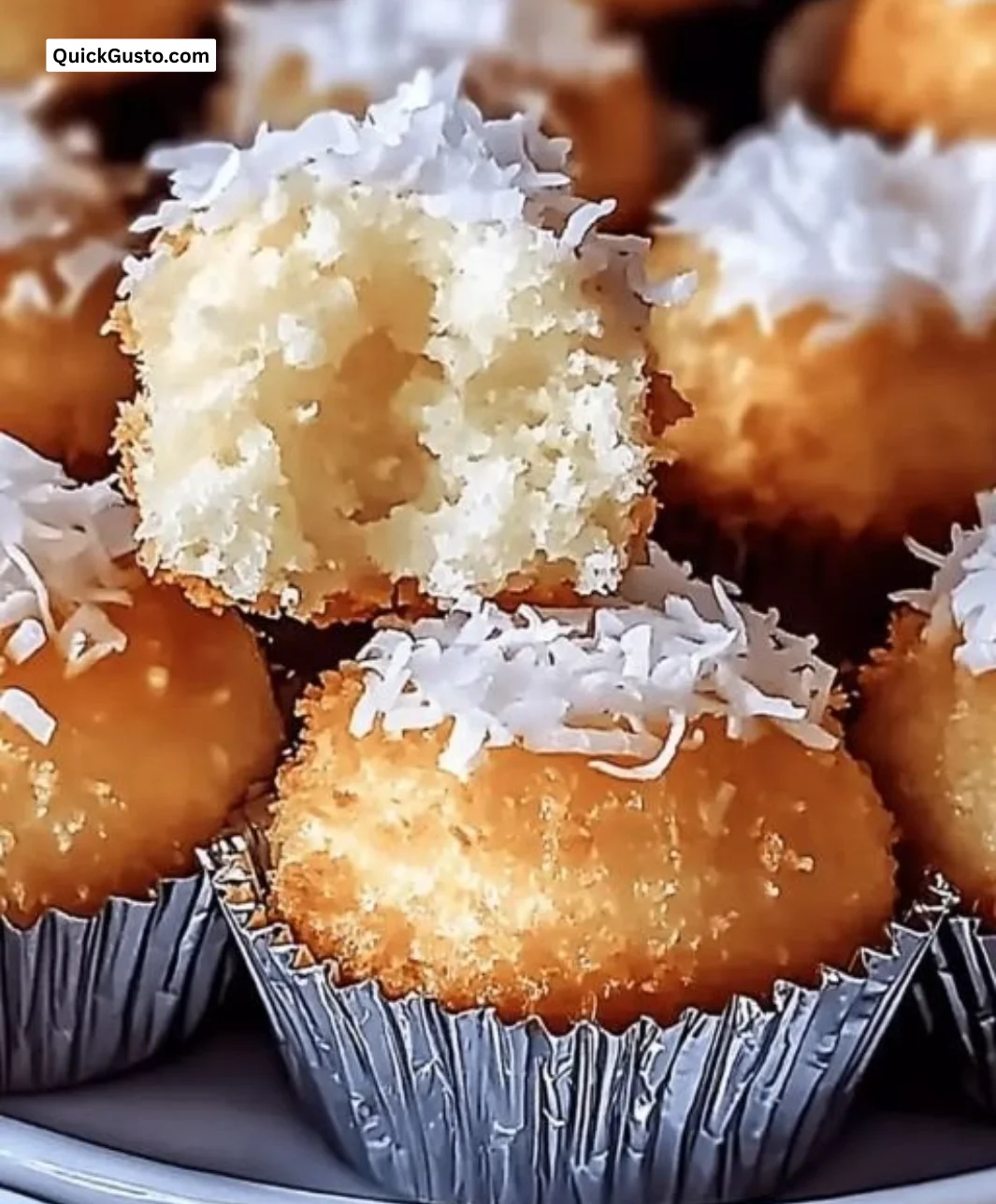 Delicious Portuguese Coconut Cakes on a decorative plate