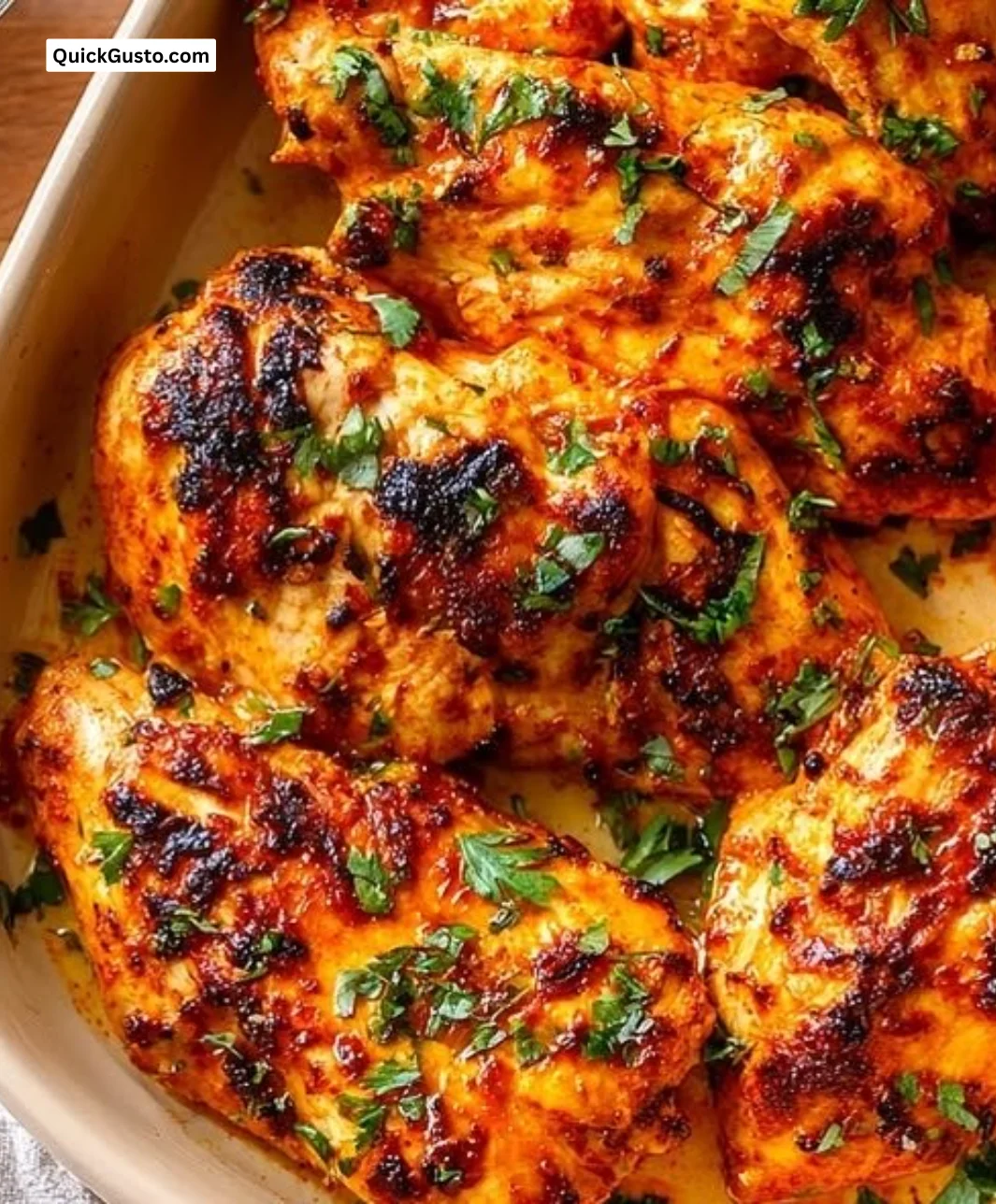 Marinated Greek chicken with yogurt in a bowl ready for grilling or baking