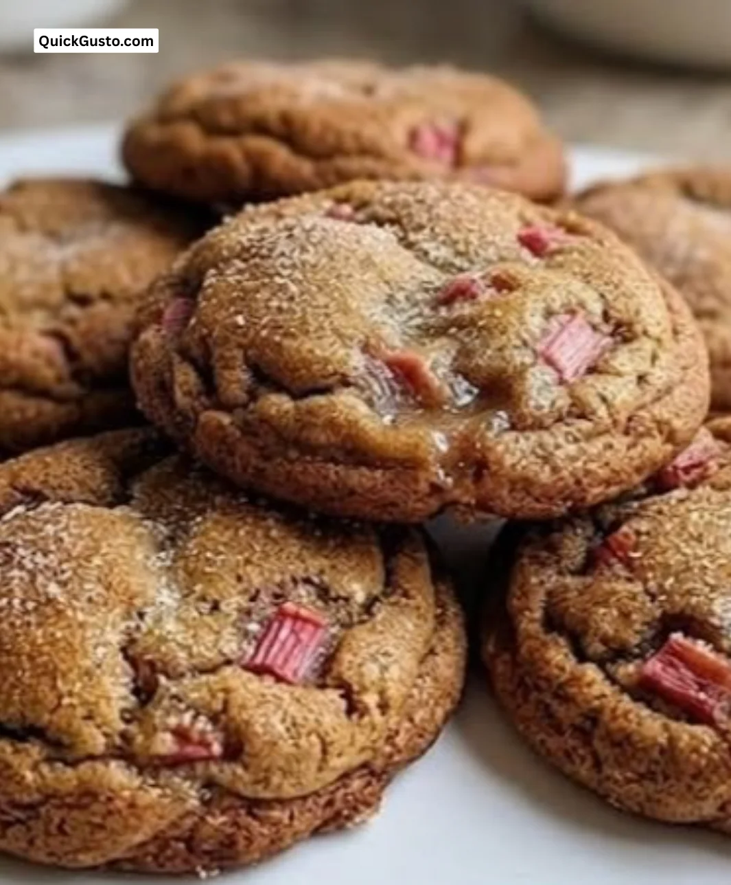 Freshly baked rhubarb brown sugar cookies on a cooling rack.