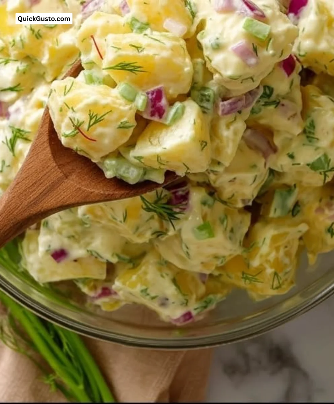 Simple pickle potato salad served in a bowl, perfect for summer meals.