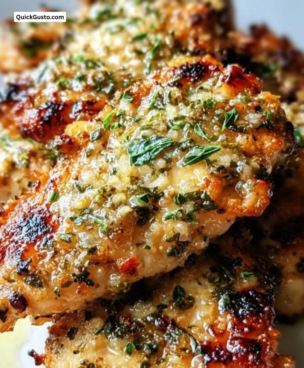 Delicious sizzling garlic parmesan chicken cooked on a Blackstone griddle