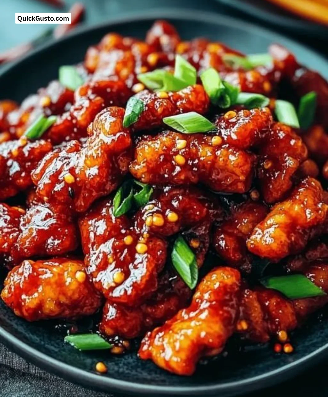 Spicy Dragon Chicken dish garnished and ready to serve