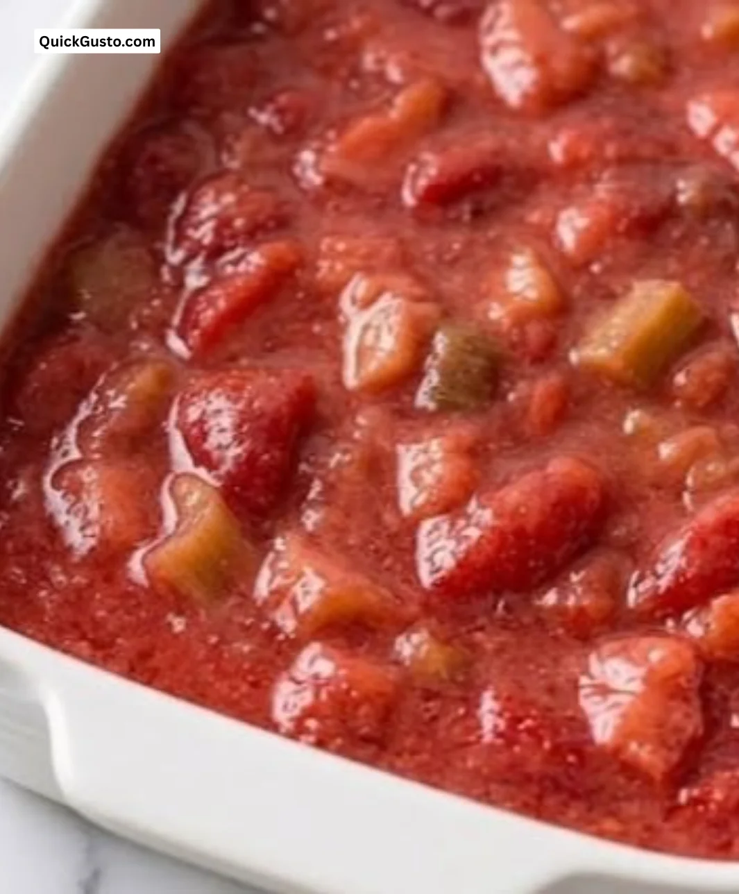 Homemade strawberry rhubarb sauce served in a bowl