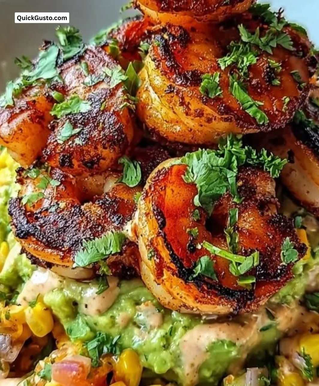 Sun-kissed grilled shrimp bowl with avocado and corn salsa served in a bowl