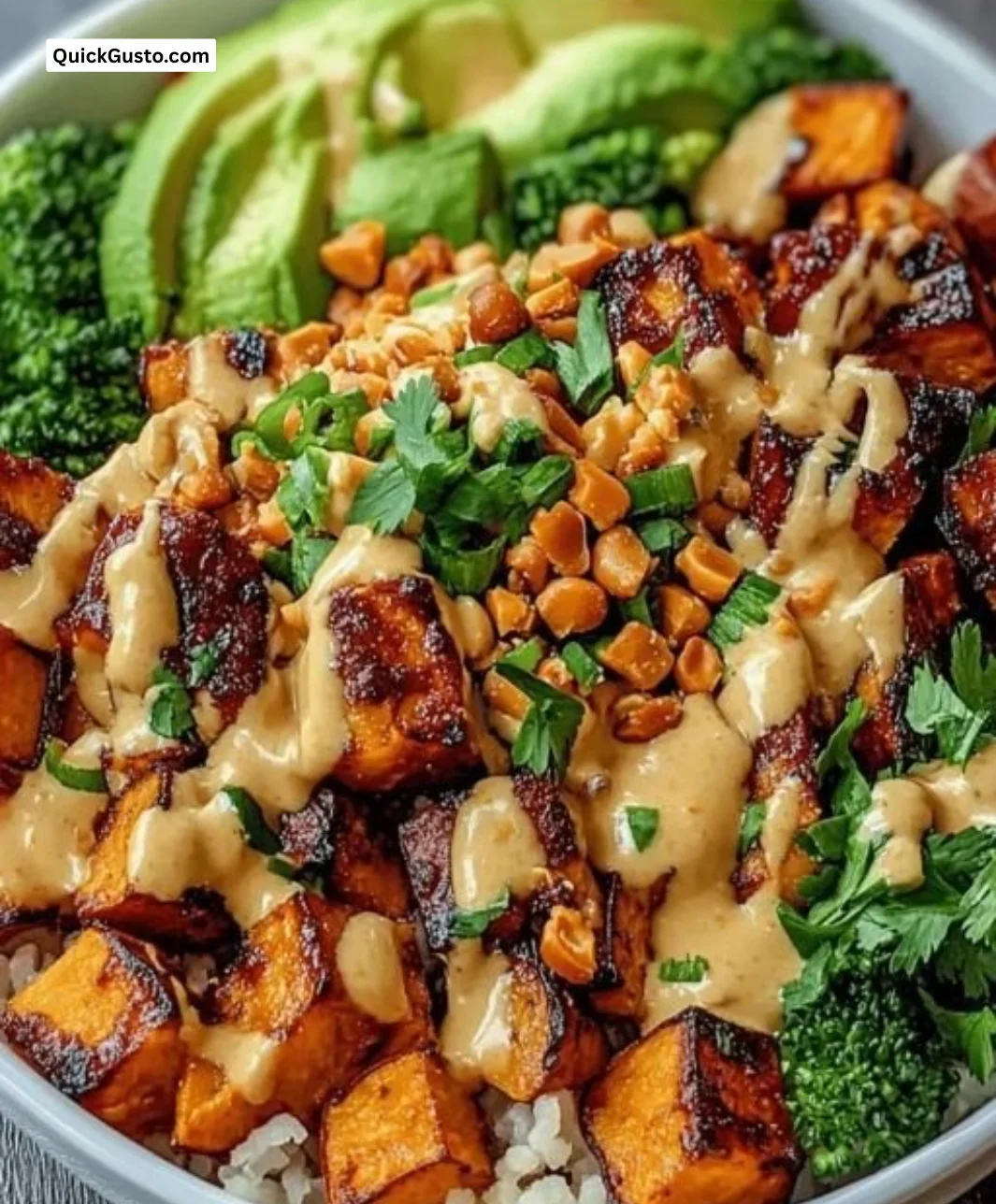Thai Peanut Sweet Potato Buddha Bowl with vibrant vegetables and creamy sauce