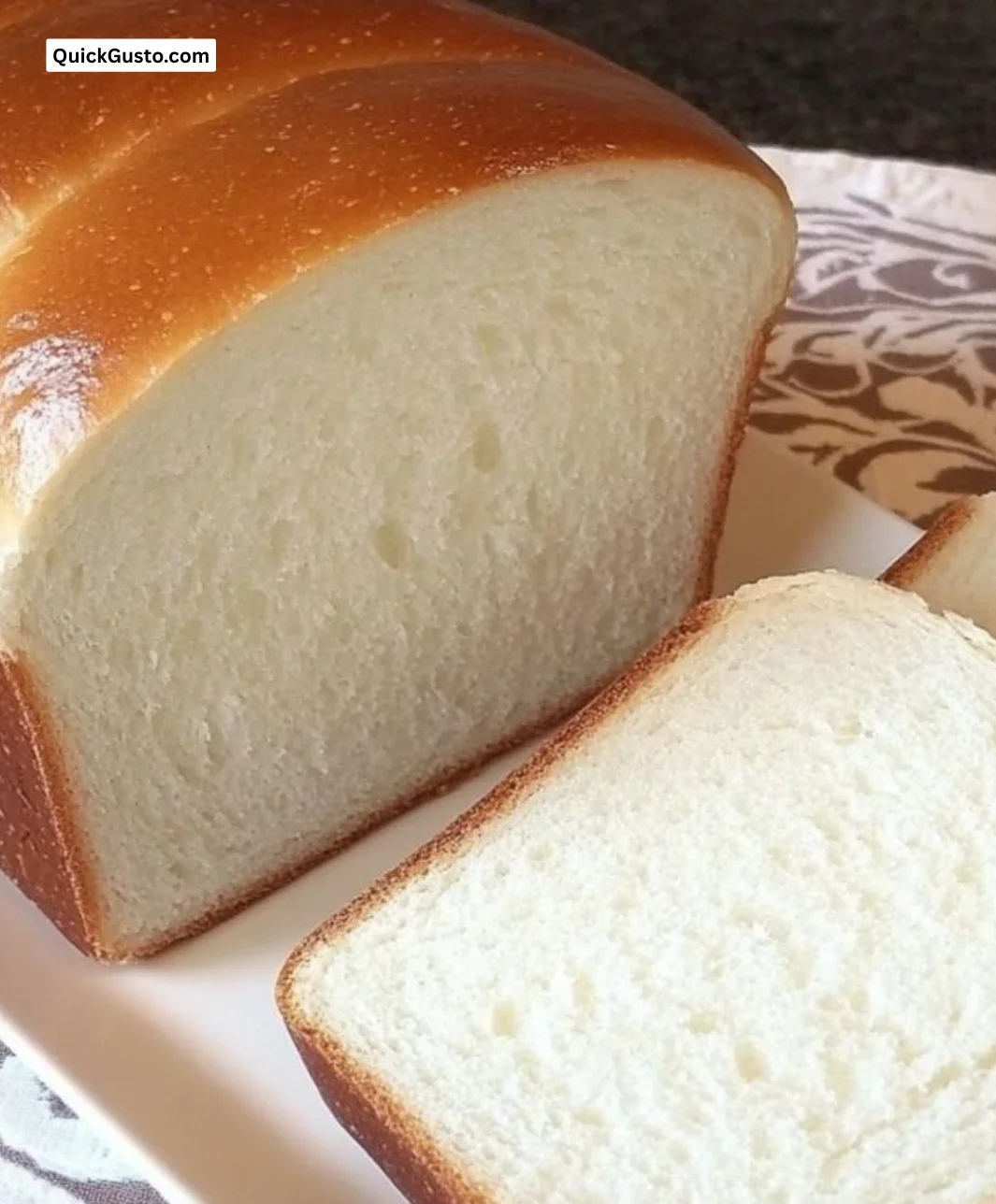 Homemade Amish white bread golden slice ready to be served.