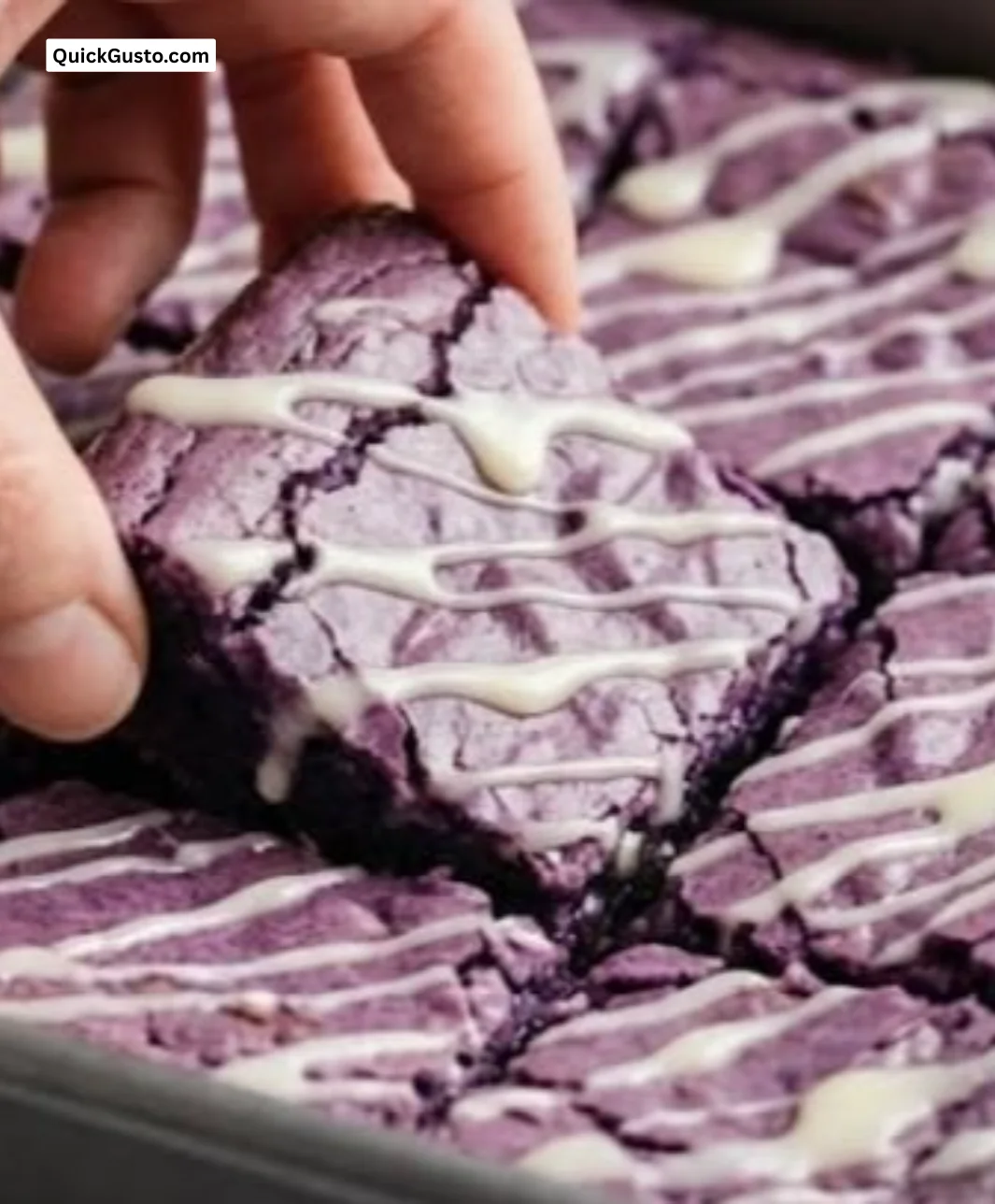 Deliciously rich ube brownies topped with a creamy frosting
