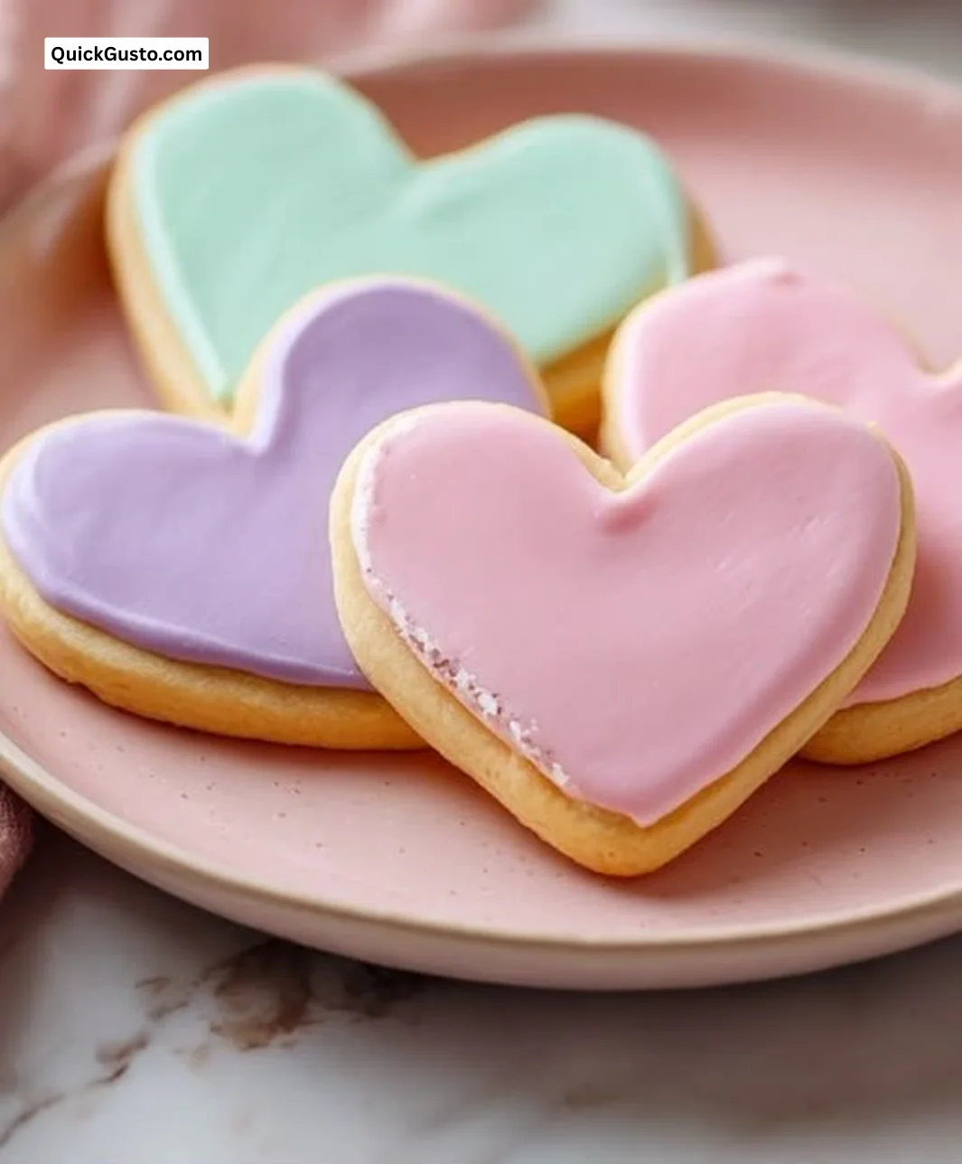 Decorated Valentine Sugar Cookies with royal icing in heart shapes