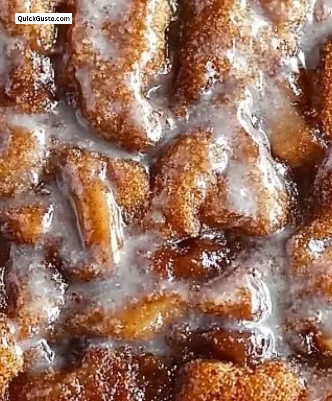 Delicious slice of Apple Fritter Cake topped with cinnamon and apples