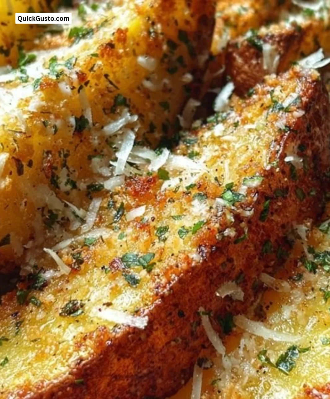 Baked garlic parmesan potato wedges served in a bowl