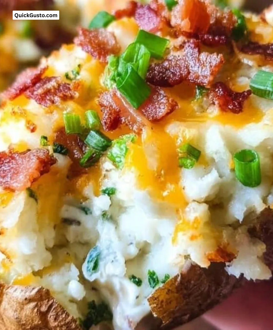 Deliciously creamy and cheesy twice-baked potatoes served on a plate
