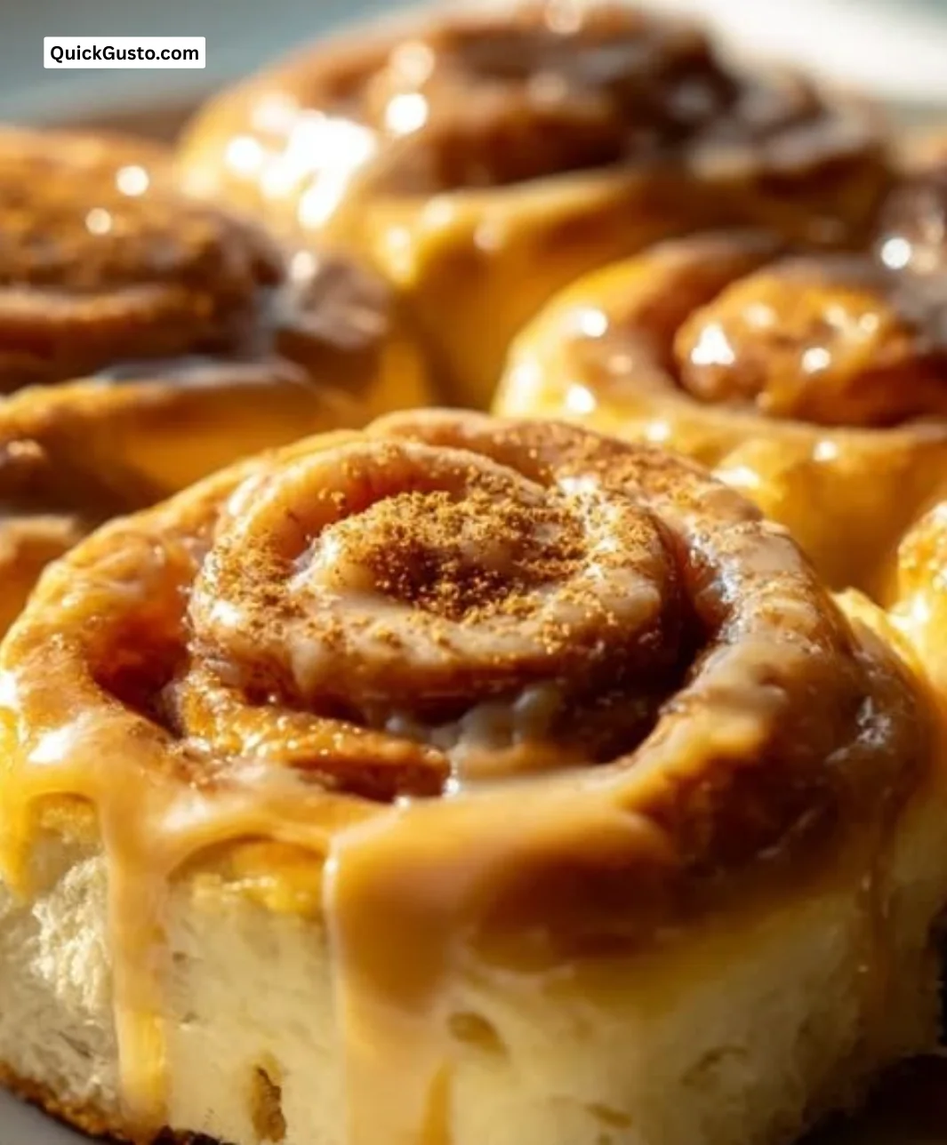 Biscoff Cookie Butter Cinnamon Rolls topped with creamy frosting.