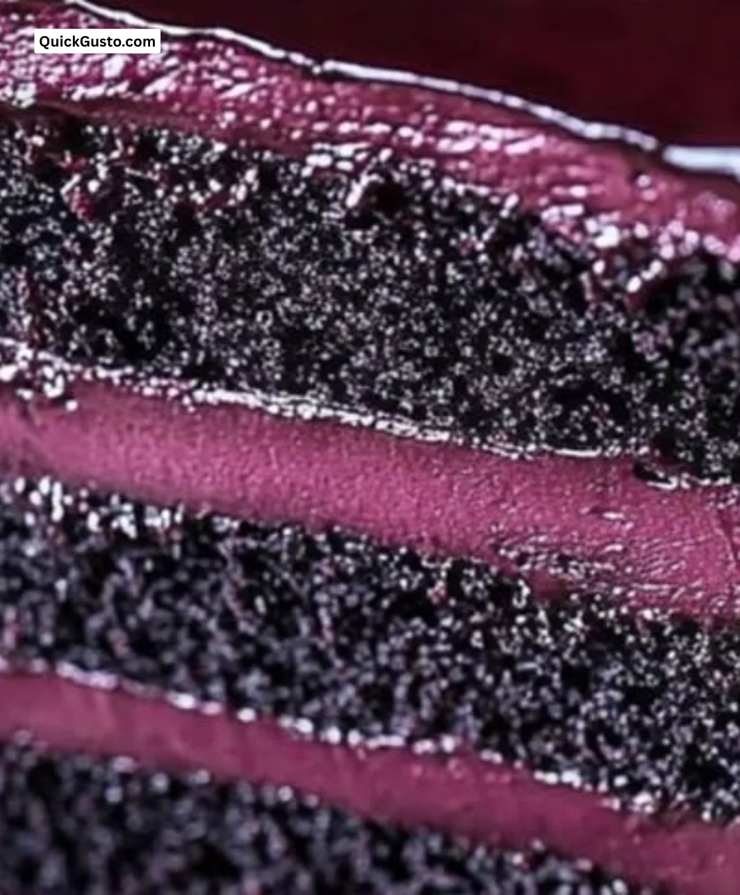 Blackberry Velvet Cake with dark gothic decorations and fresh blackberries on top